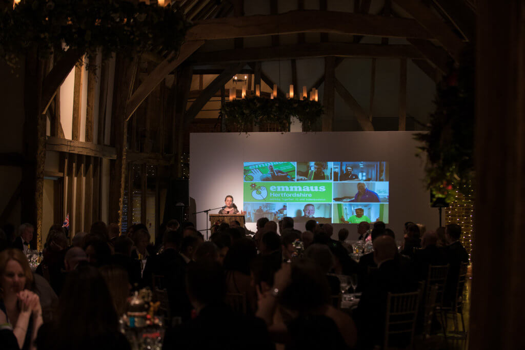 Micklefield Hall corporate event in great barn Charity fundraiser with large screen