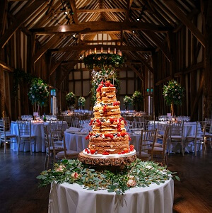 Micklefield Hall wedding, tall, 4 tier naked wedding cake in great barn