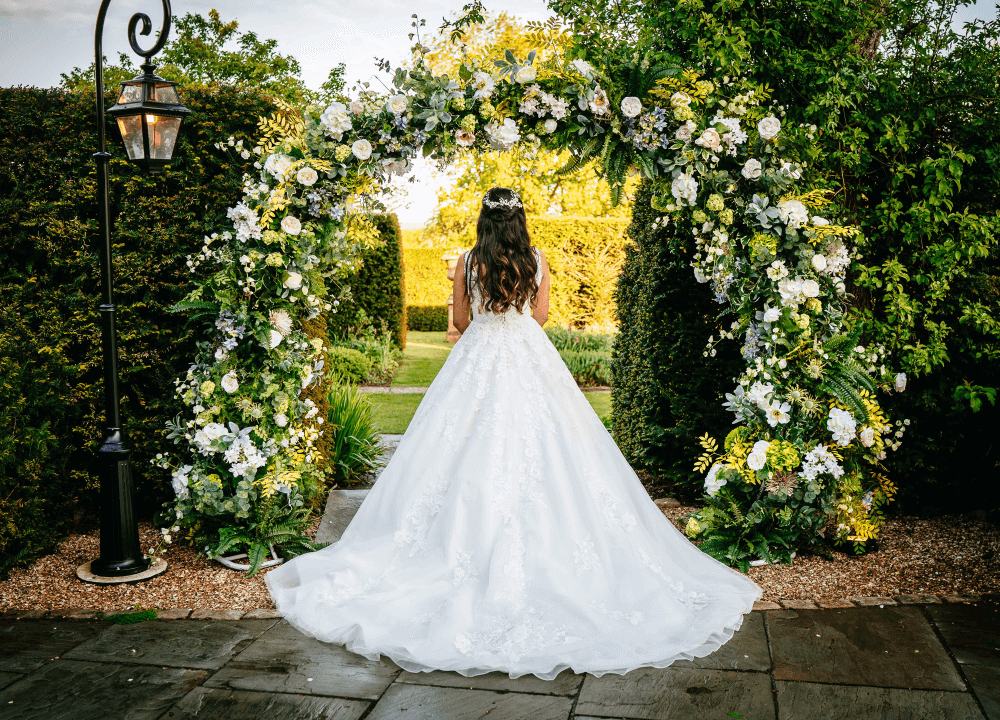 Micklefield Hall : Sarah Legge Photography : bride flower arch