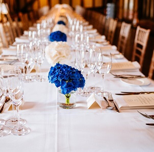 Micklefield Hall : Sarah Legge Photography : blue and white table in great barn