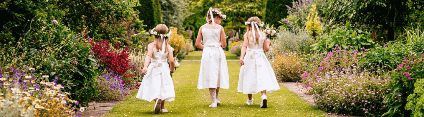 Mickelfield Hall weddings, flower girls in herbaceous borders