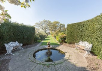 Micklefield Hall film location - Herbaceous borders fountain