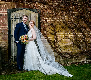 The newly married couple enjoying some couple pictures during their february wedding at micklefield hall