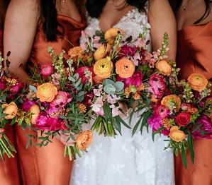 bouquets in red, green, orange and pink 
