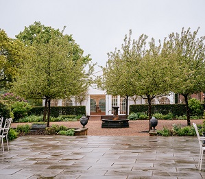 courtyard area and marquee on a rainy wedding day at micklefield hall 