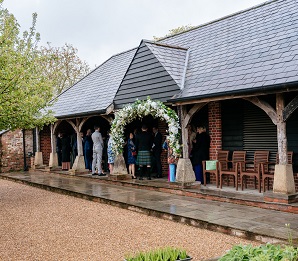 courtyard area on a rainy wedding day at micklefield hall 