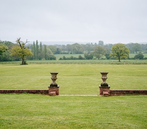 beautiful view of fields on a rainy wedding day at micklefield hall 