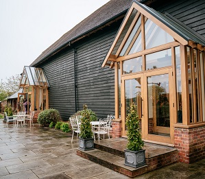 great barn on a rainy wedding day at micklefield hall 